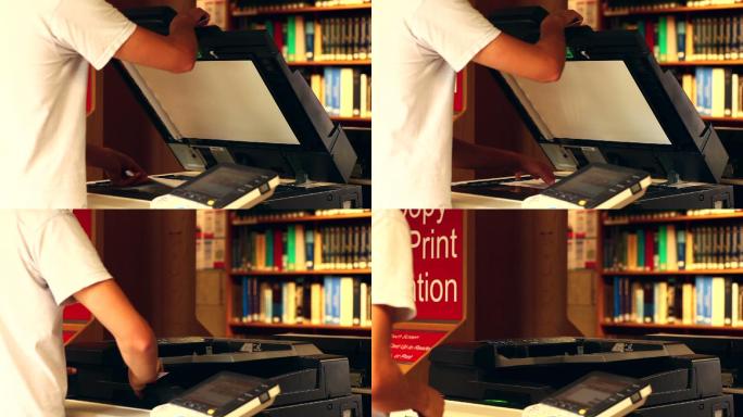 学生在大学图书馆使用影印机