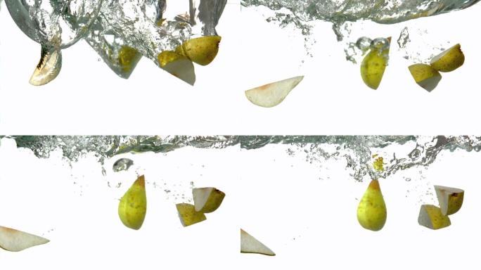 在慢镜头中，白底上的梨子片段投入水中