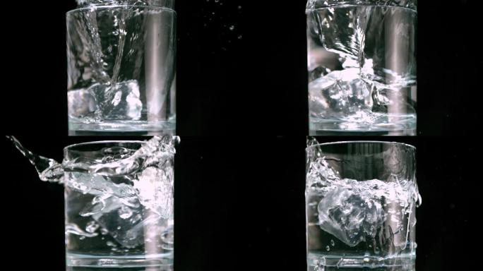 冰块掉入装满水的玻璃杯中特写