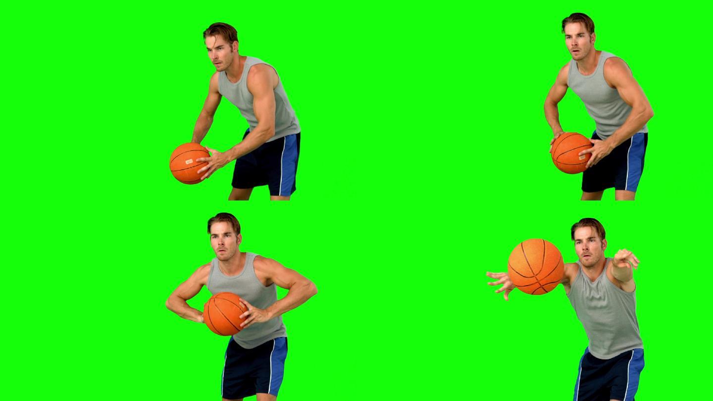 一个男人在镜头前打篮球特写