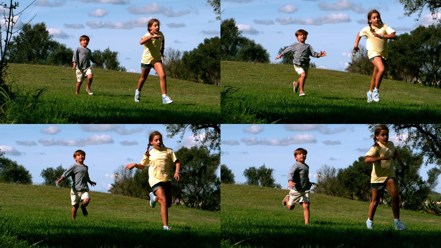 两个孩子在公园里奔跑的慢镜头