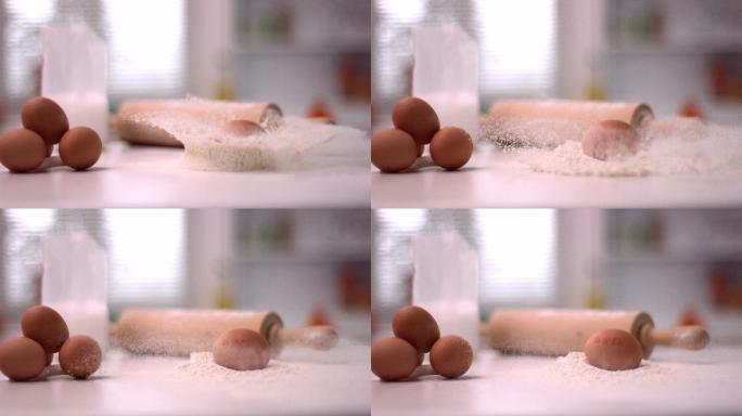 鸡蛋在面粉堆中缓慢下落
