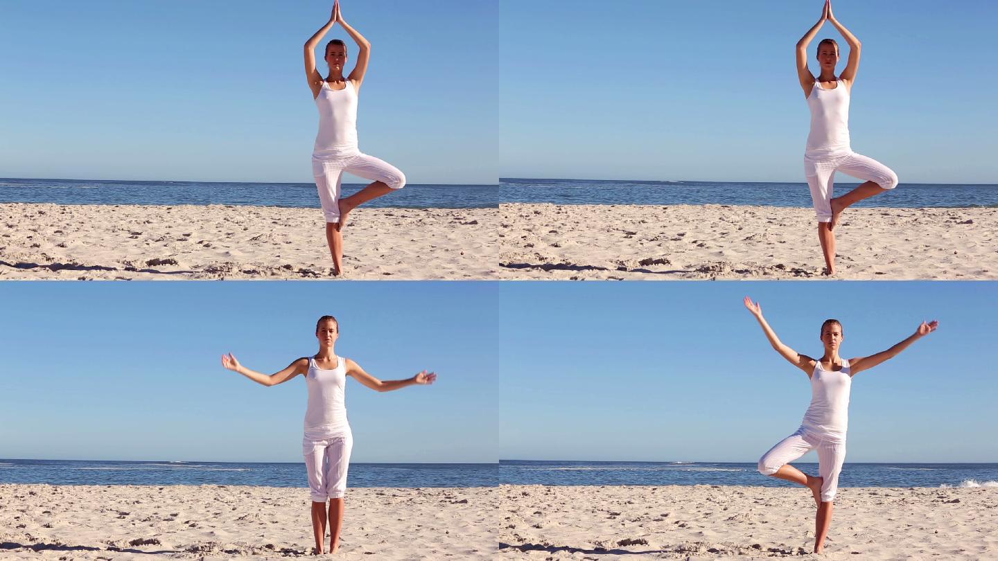 女人在海边练习瑜伽特写