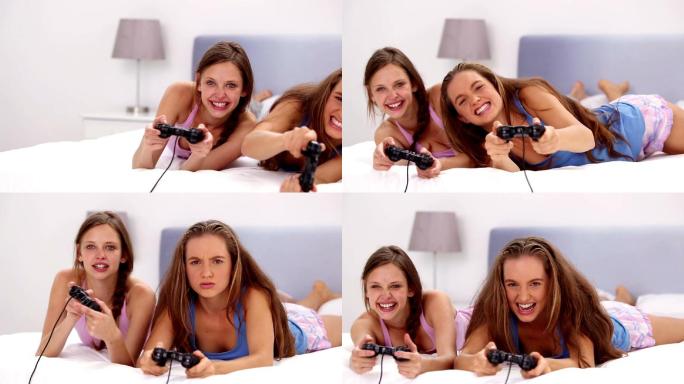 两个女孩在床上打游戏特写