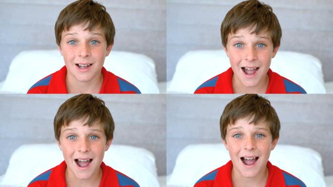 蓝眼睛的男孩在250帧每秒的慢动作中感到惊讶