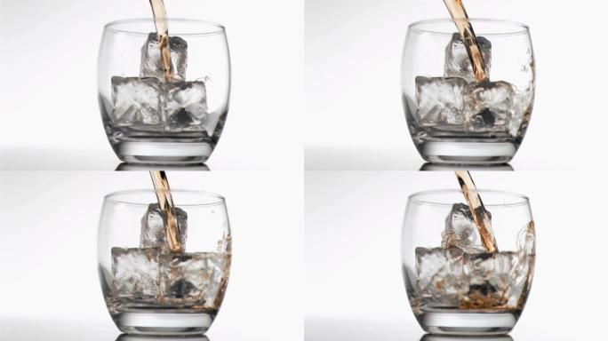 威士忌倒进装满冰块的杯中特写