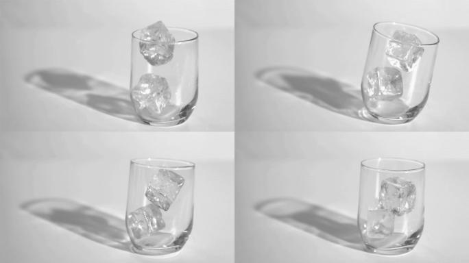 冰块掉入玻璃杯中特写