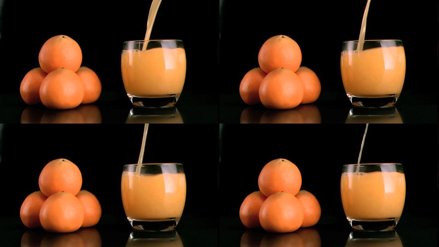橙子和倒橙汁特写橘子汁桔子汁饮料