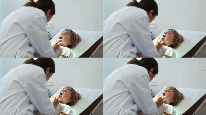 医生在检查室里看孩子的口腔特写