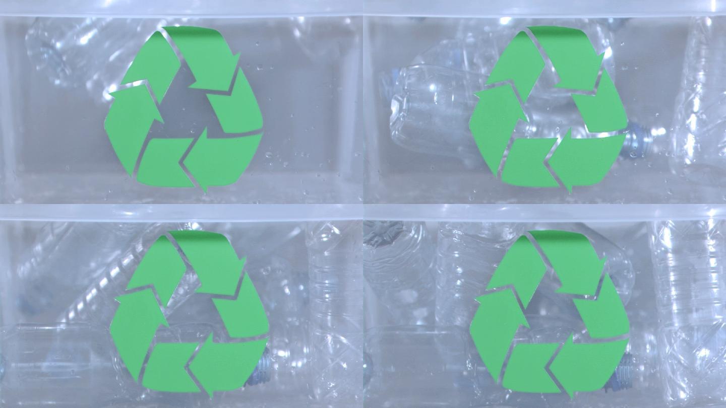 塑料瓶落入回收箱特写
