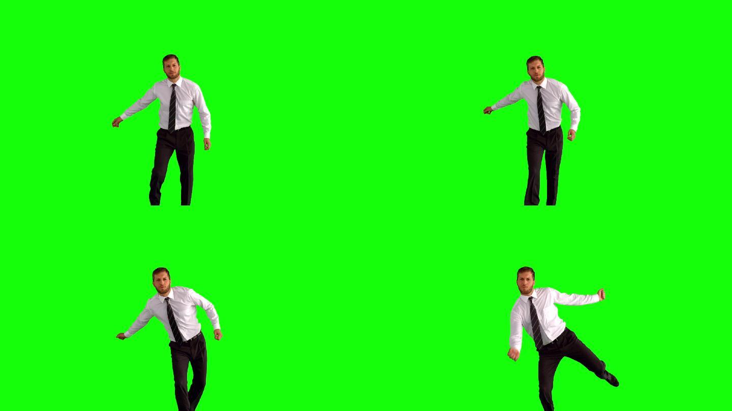 绿色背景下男人跳起来欢呼特写