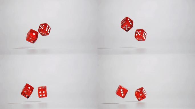 两颗红色的骰子掉落转动特写