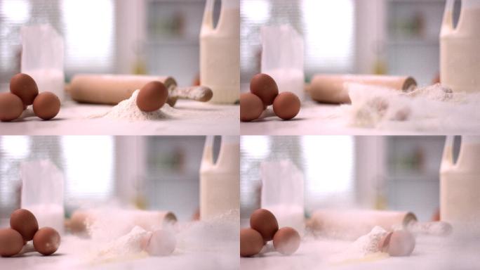 用慢镜头把鸡蛋压碎在面粉堆里