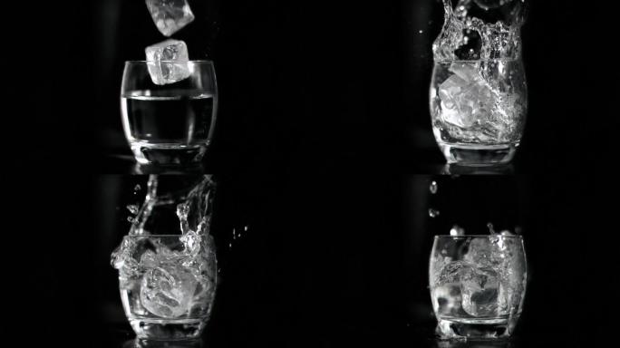 冰块掉落在一杯水里特写
