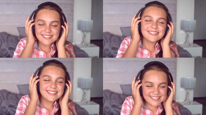 一个女孩用耳机听着500帧每秒的慢动作音乐