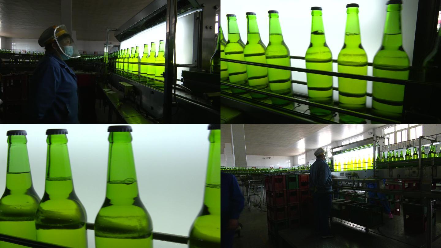 啤酒厂生产线流水线工人观察啤酒的杂质破损