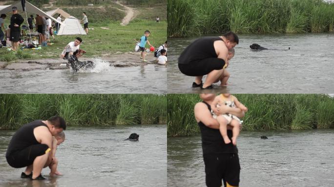 河里一只狗狗顺流而下去捡东西河边一对父子