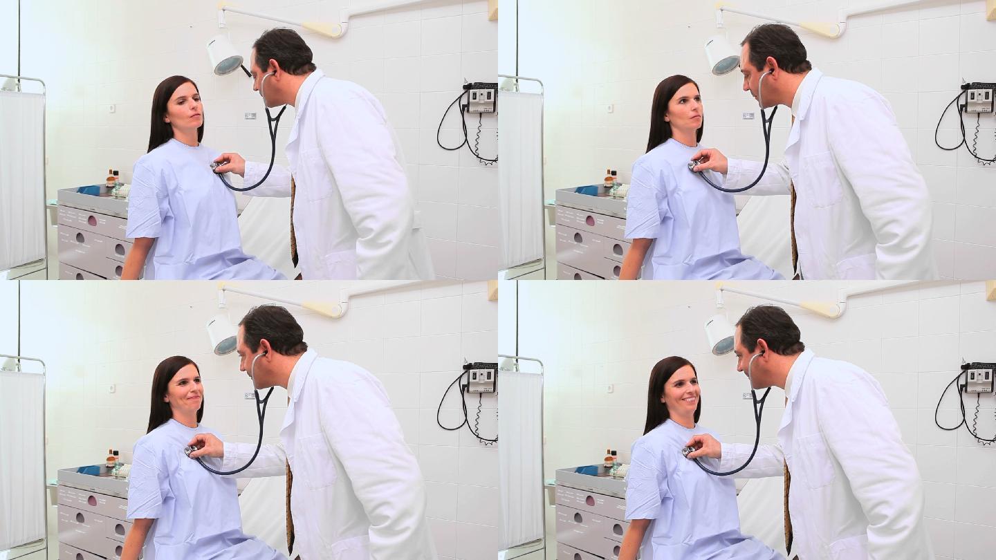 微笑的医生在检查室听诊一个女人