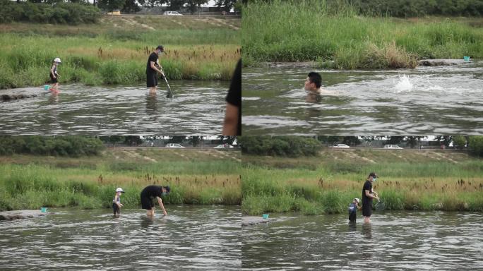一位爸爸带着孩子在河里捕鱼一个男子游泳