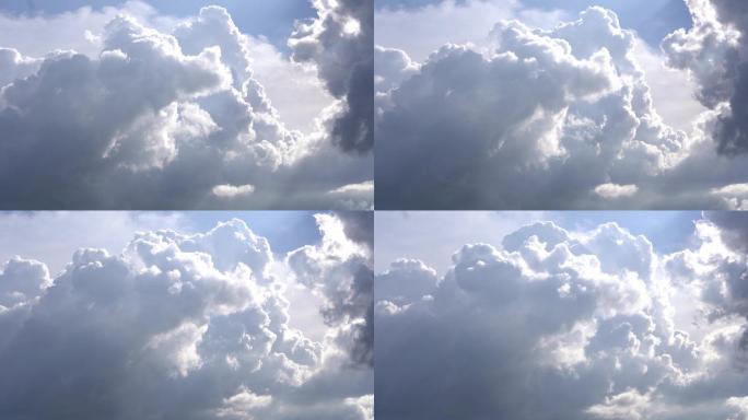 高温炎热夏天天空白云翻滚云层阳光延时云团