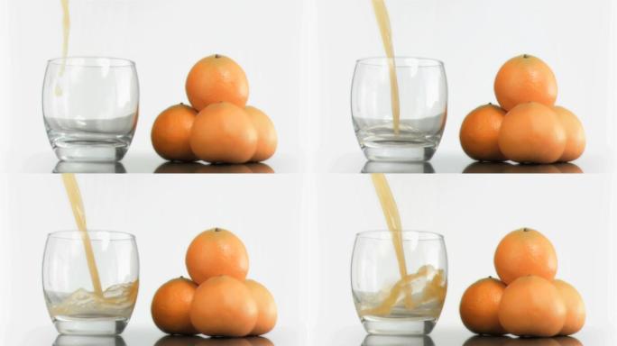 橙子和倒橙汁特写橙子橙汁倒入杯子广告片淘