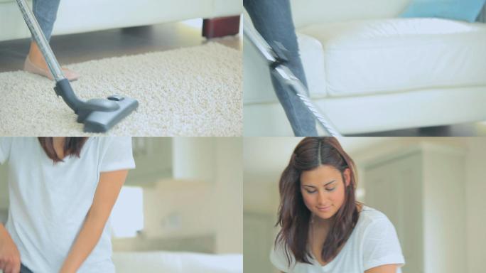 一个女人用吸尘器吸白地毯的视频