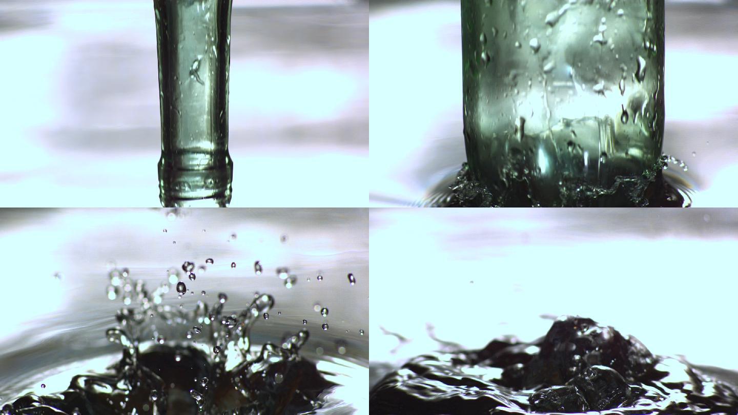 一个玻璃瓶落入水中特写