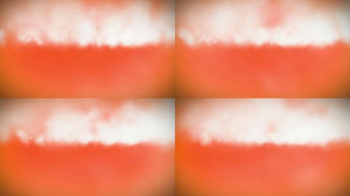 橙色背景下的白云抽象抽象背景特效视频