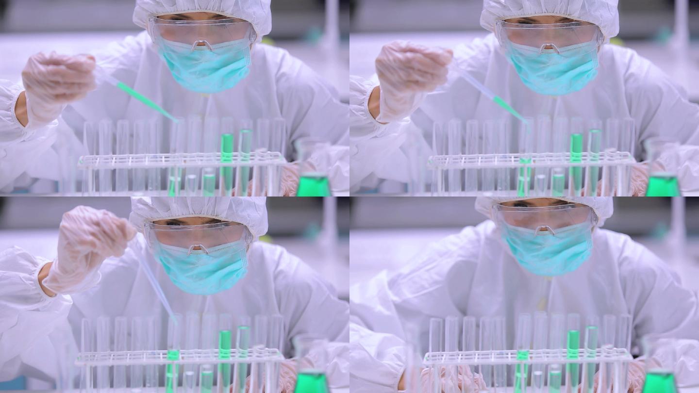 穿着防护服的化学家在实验室做实验特写