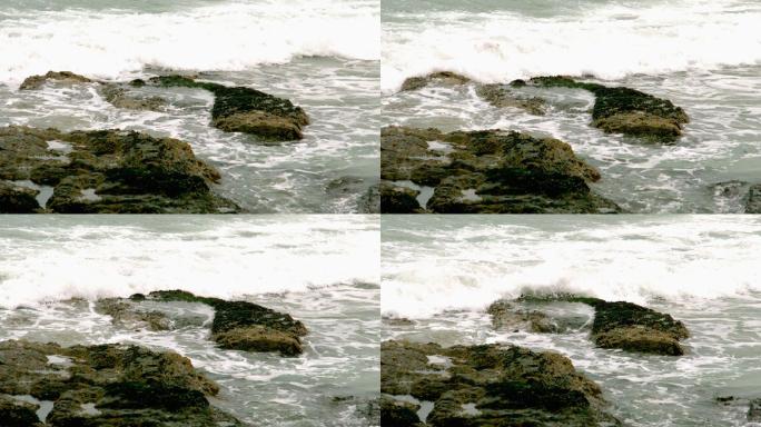 海浪以慢动作冲击着岩石