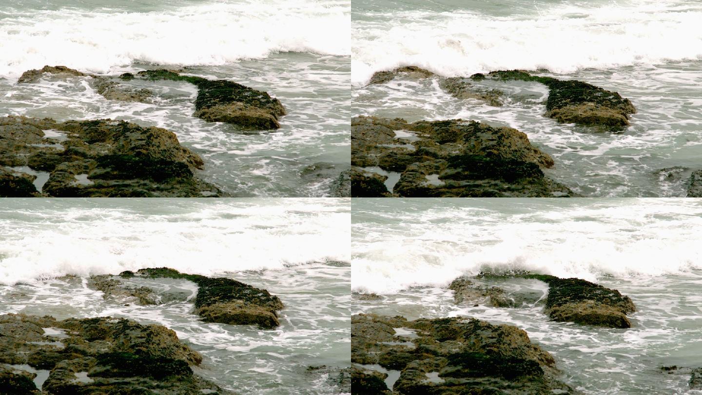 海浪以慢动作冲击着岩石