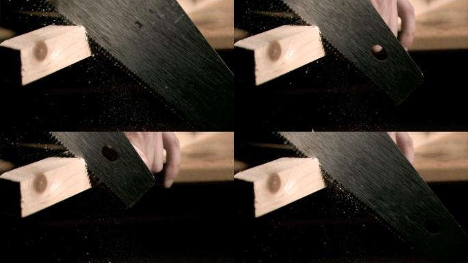 在《近距离》中，一个男人用超慢的动作锯着一块木板