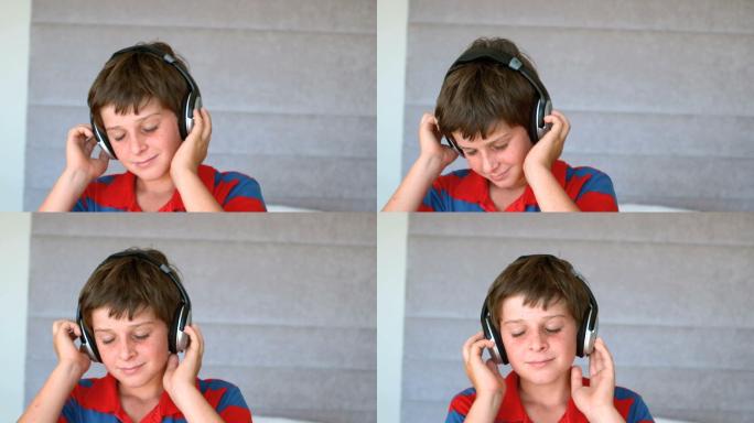 跳舞的小男孩戴着耳机，以每秒500帧的慢动作欣赏着音乐