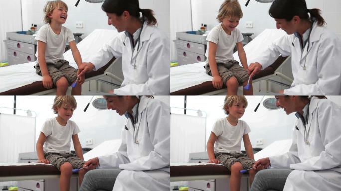 医生在检查室测试一个孩子腿特写
