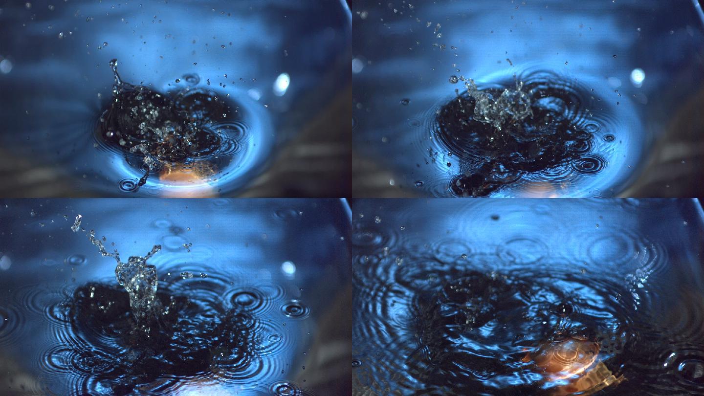 洋葱掉进蓝色的水里，慢镜头里漂浮着