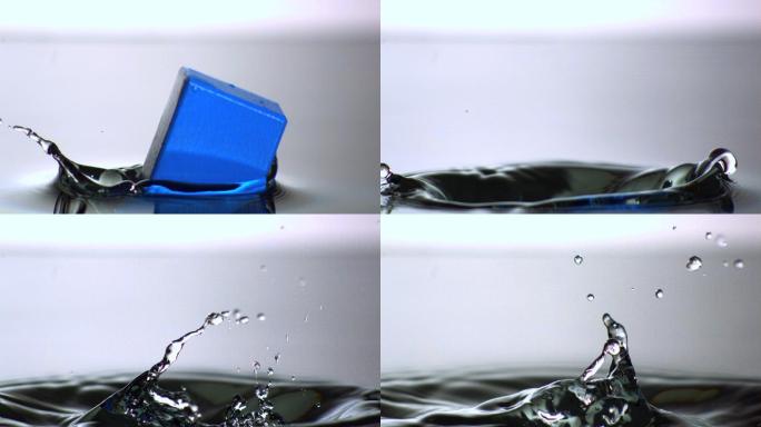 蓝色方块在水中的慢镜头