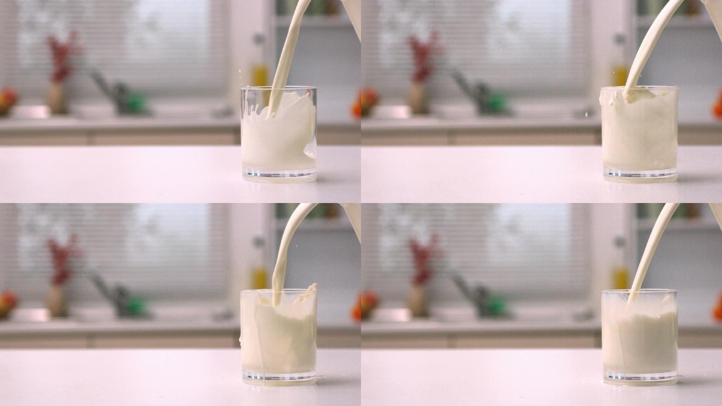将牛奶倒入厨房的玻璃杯中特写