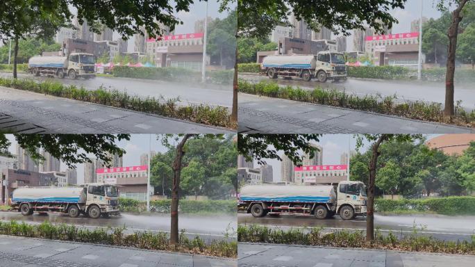 城市环卫车辆洒水车清洗街道冲洗街马路