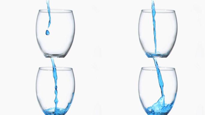 蓝色的涓涓细流以超慢的动作在白色的背景下流淌在酒杯里
