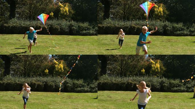 小女孩追着哥哥玩风筝的慢镜头