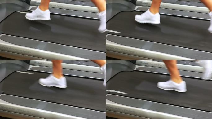 Feet running on treadmill in gym