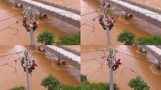 洪灾中供电工人抢修线路