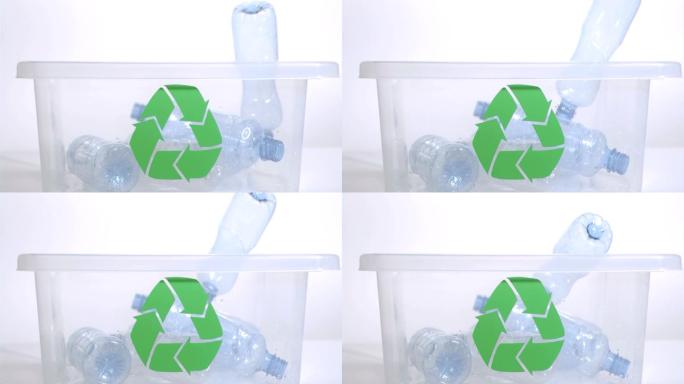 瓶子以超慢的速度落入塑料回收箱