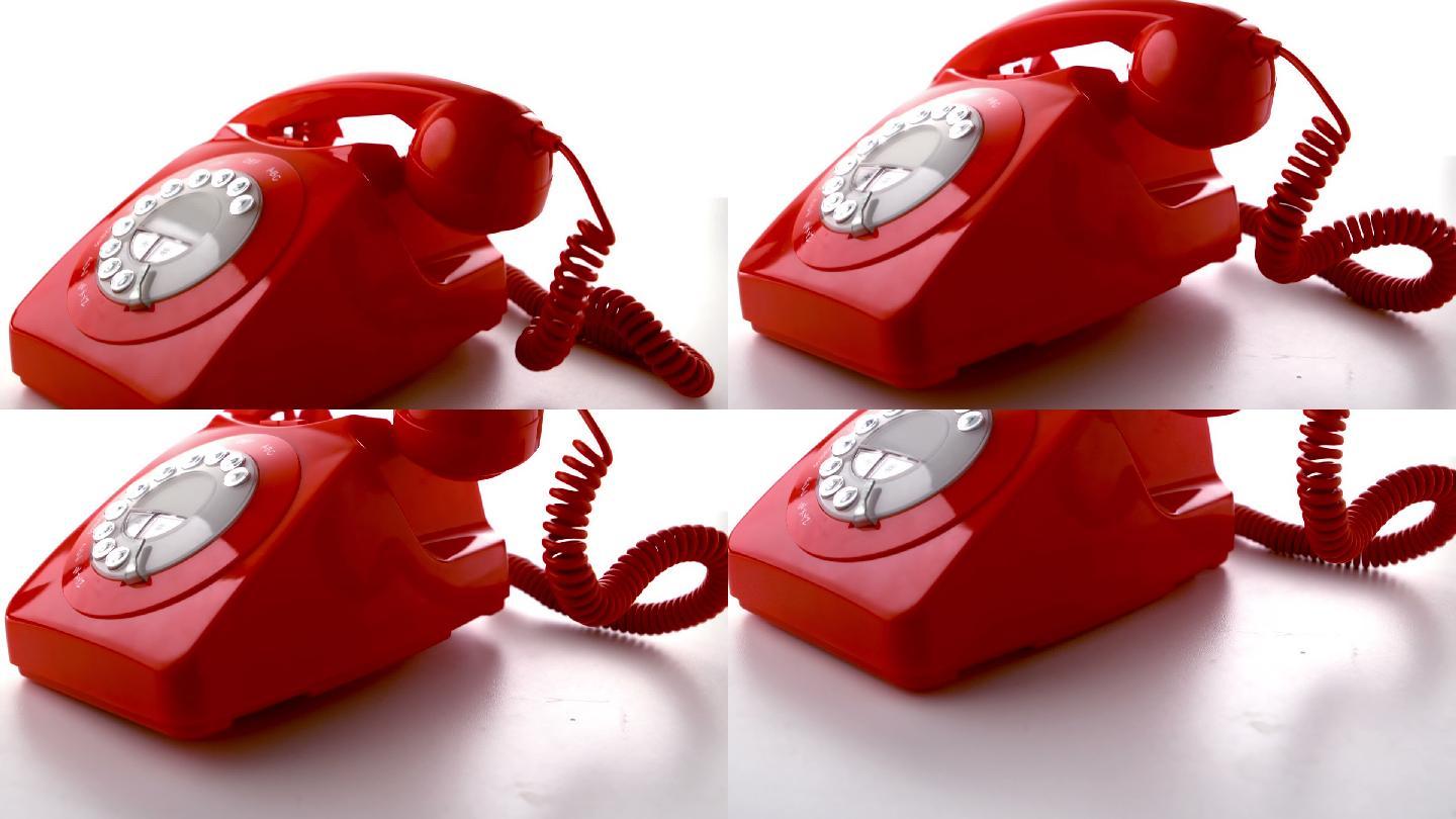 红色电话的听筒器掉落在电话上特写