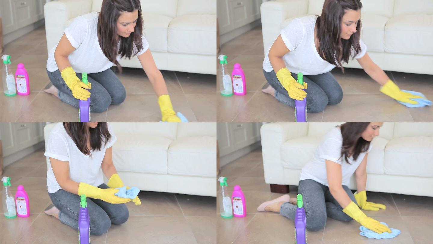 女人用清洁剂擦地板特写