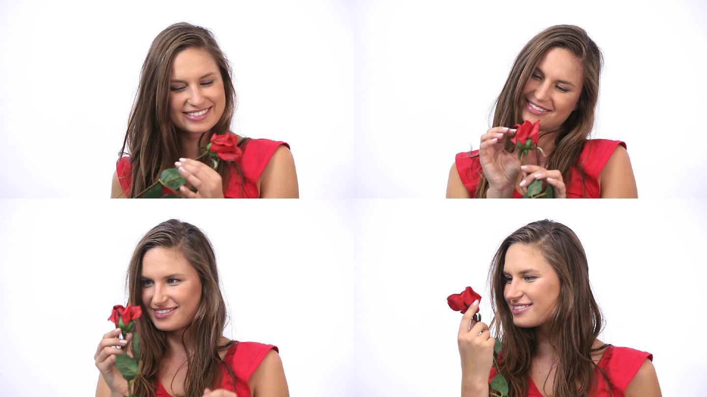 一个快乐女人拿着玫瑰的视频