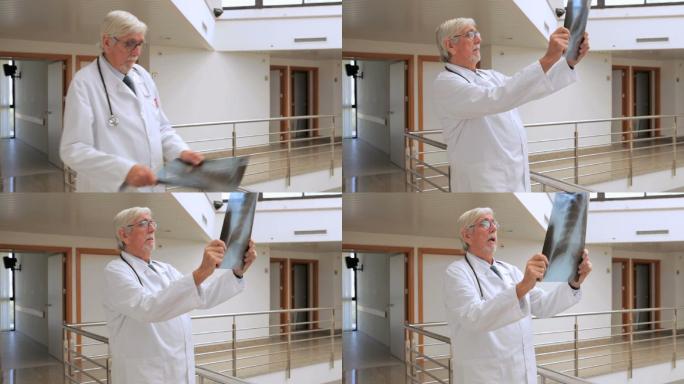 一名男医生在走廊里看x光片的视频