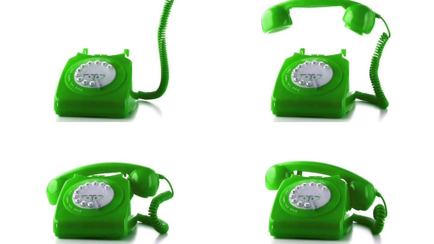 绿色电话的听筒起掉落在电话上特写