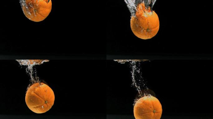 一个橙子落入水中特写
