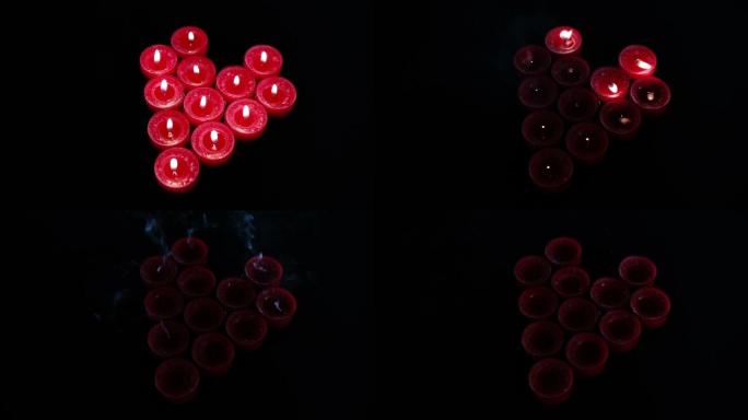 红色蜡烛摆成心形特写
